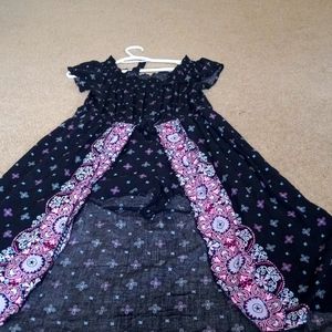 Romper. There are shorts underneath the over skirt